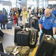 Illustration for article titled TSA Finds Guns, Ammo, 58 Bricks of Pot in Womans Luggage